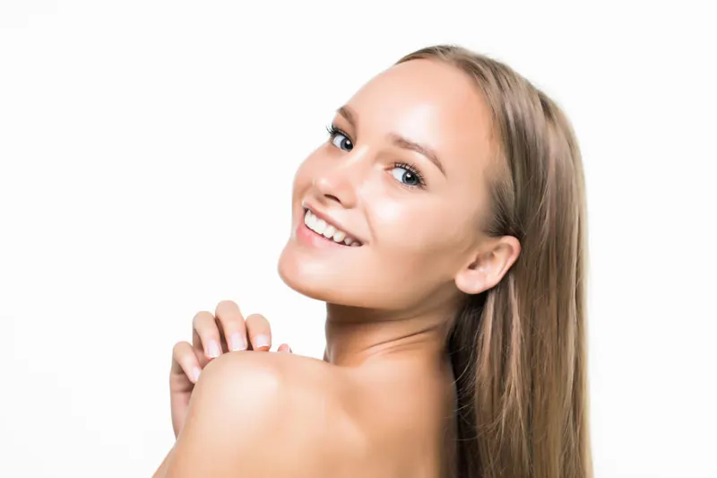Beautiful woman with glowing skin inspired by niacinamide skincare