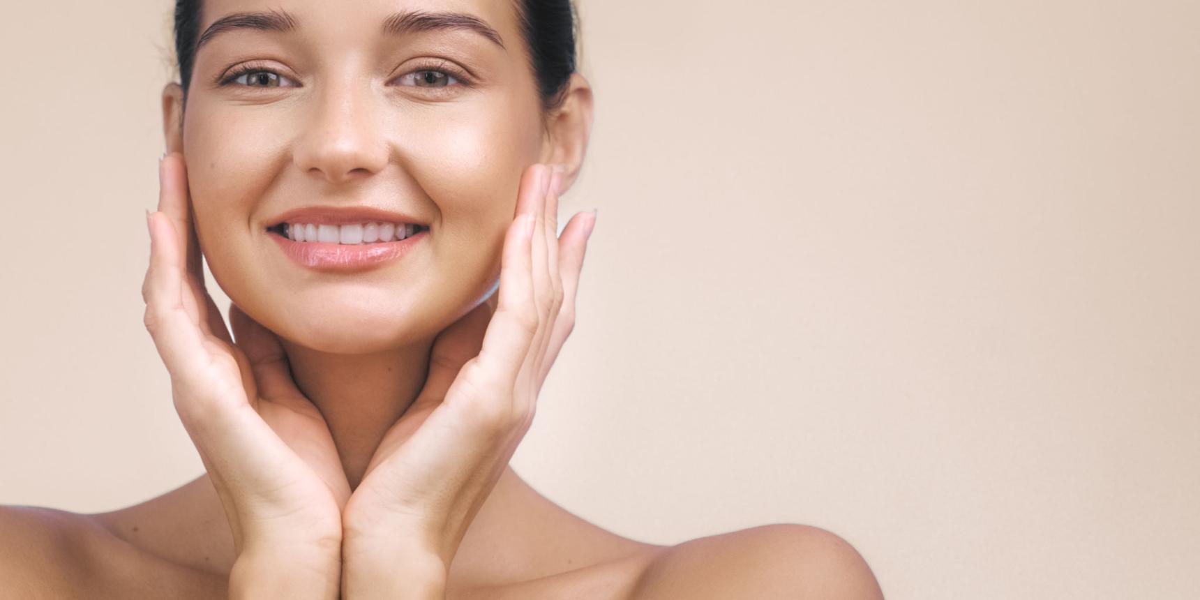 Beautiful woman with hydrated radiant healthy-looking skin