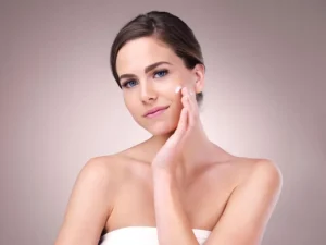 Woman with radiant collagen-inspired skincare beauty look