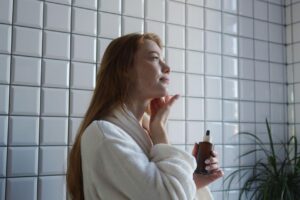 Luxury collagen face cream with glowing skin beauty aesthetic
