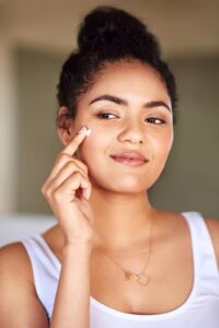 Woman with glowing hydrated skin showing healthy collagen-supported skincare results